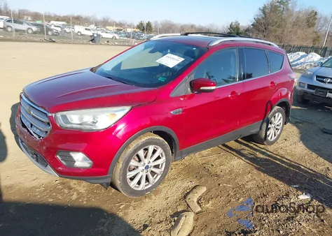 2017 Ford Escape Titanium z USA, uszkodzony, nr VIN 1FMCU9J93HUA07382